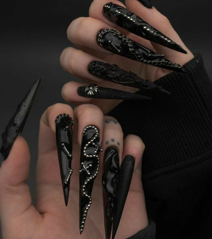 #GothicNails #GothicManicure #DarkNails #EdgyNails #AlternativeNails #NailDesigns #BlackNails #MetallicNails #NailArt #NailInspiration #GothicStyle #BoldNails #DarkFashion