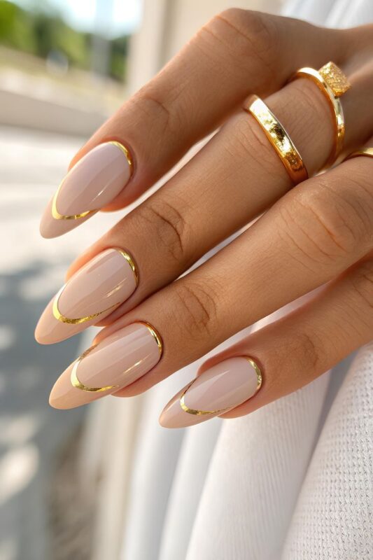 Minimalist Nude Nails with Gold Accents