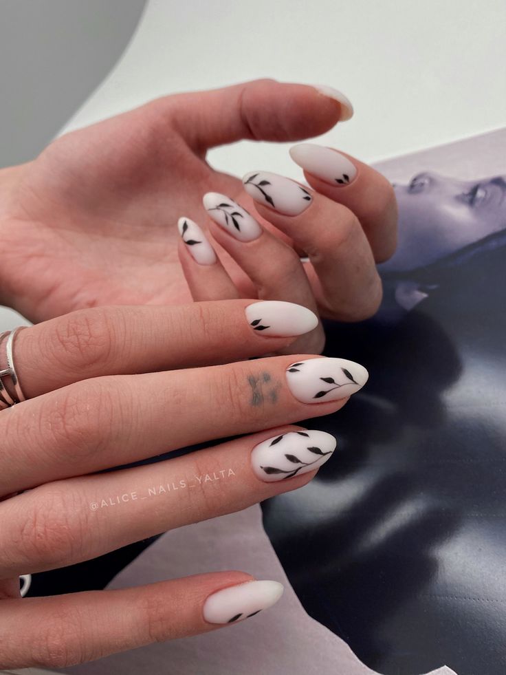 Abstract art on milky white nails