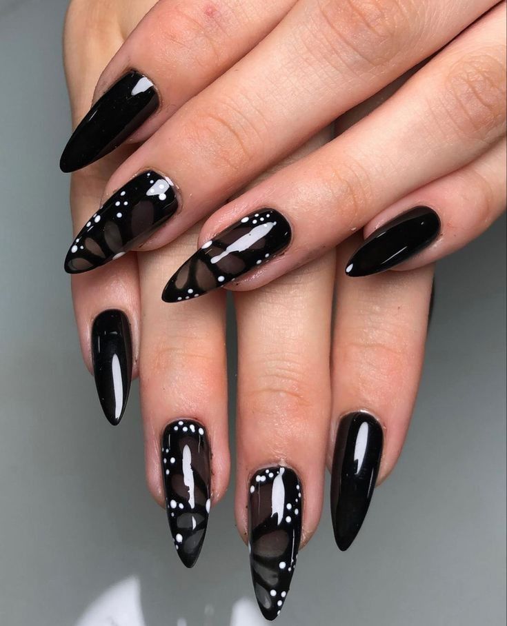 black lace designs on a white base nail