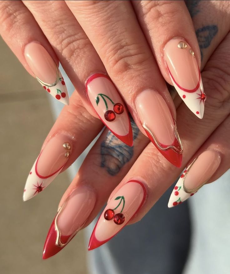 cherry red nails with bold geometric patterns