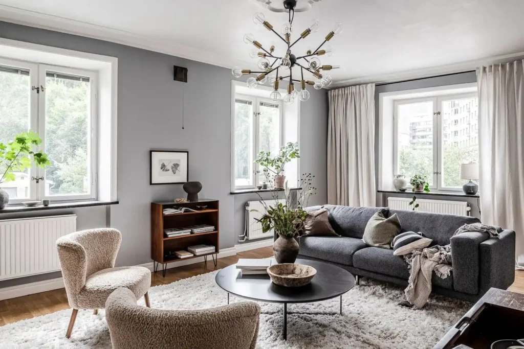 gray couch fits within a mid-century modern setting.