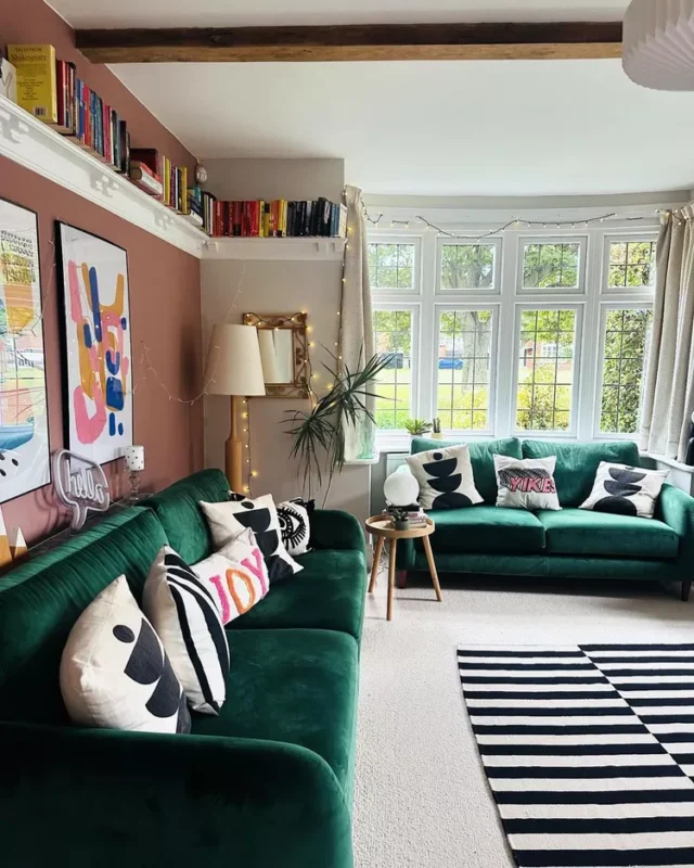 Maximalist Living Room with a Dark Green Sofa