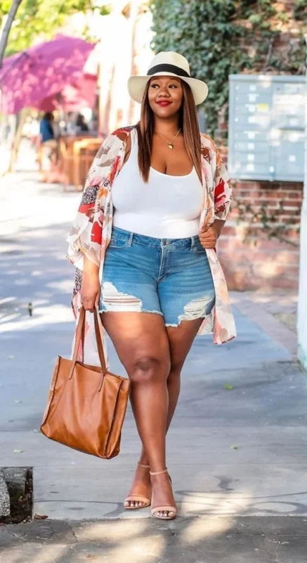 White Bodysuit with Denim Shorts Over Printed Jacket and Ankle Heels