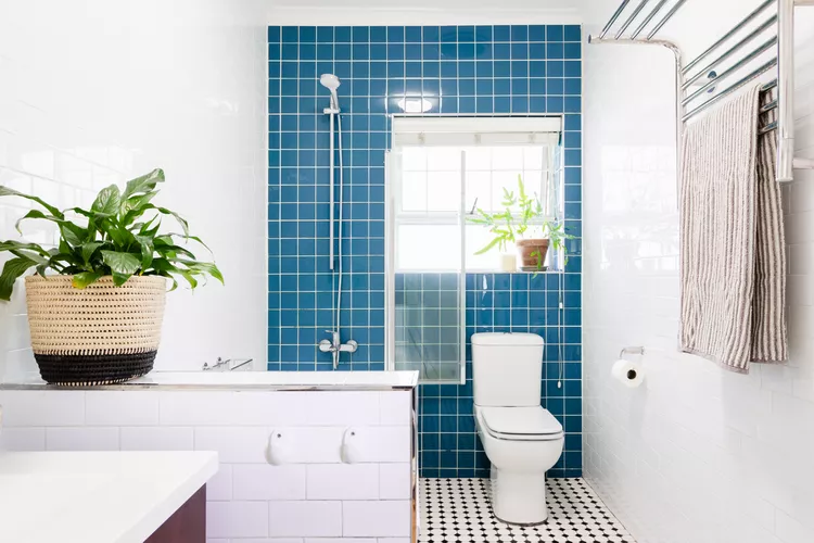 blue bathroom tiled shower walls