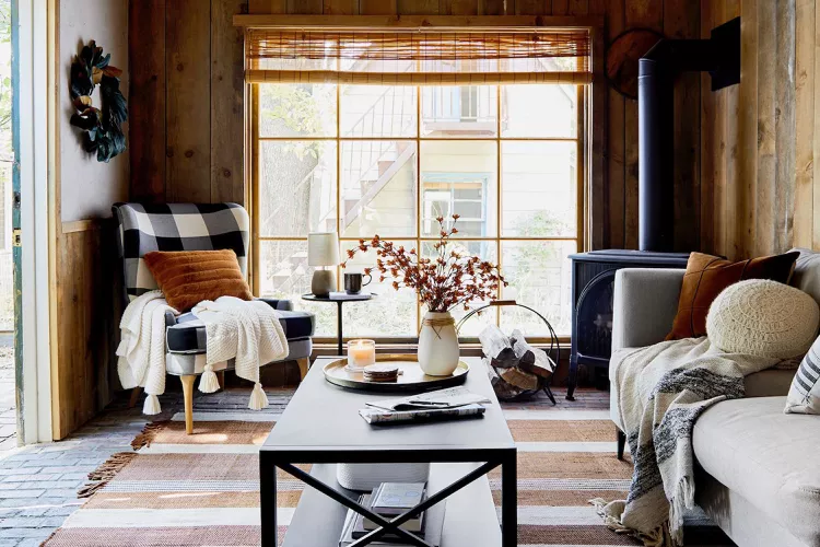 a decorated living room for fall